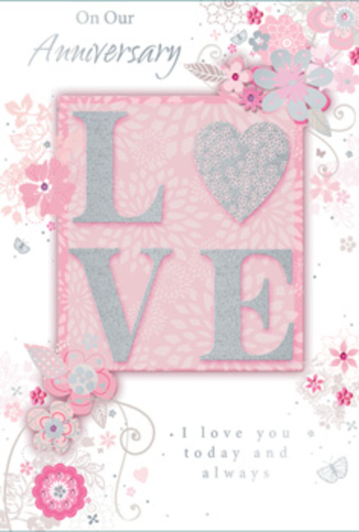 In this image, a romantic anniversary card is shown in close detail, capturing the soft, floral artistry that feels right at home in West Green's leafy neighbourhoods. The design centres on the word "LOVE," printed in a bold yet graceful font and raised from the card stock so it appears almost sculpted. A dusting of fine, frosted glitter traces the edges of each letter, catching the light in a way that recalls morning sun glinting off fresh petals laid out for arranging. The "LOVE" motif rests on a gentle blush-pink background, subtly shaded, like the inner petals of a rose held up to the light by a florist preparing an anniversary bouquet. From around this central panel, a cascade of hand-drawn blooms and foliage sweeps across the card. The flowers are soft and stylised rather than botanically strict, rendered in shades of blush, lilac, ivory, and silver-grey, their outlines delicate and slightly whimsical. They swirl outward in loose arcs, much like the flowing shape of a bouquet designed to cradle easily in the hands. Fine filigree lines, trailing vines, and tiny leaves weave between the blossoms, with occasional, almost-hidden butterflies adding a sense of quiet movement, as if hovering over a garden near Green Lanes on a still evening. Silver accents glimmer discreetly among the petals, giving the card a refined, celebratory sparkle. Inside, the sentiment-phrased along the lines of "I love you today and always"-is set in elegant, flowing script, leaving space around the words so they feel calm and intentional. The overall impression is of a gentle yet deeply felt tribute, like a hand-tied arrangement created for a long-married couple in West Green, full of gratitude, tenderness, and lasting affection.